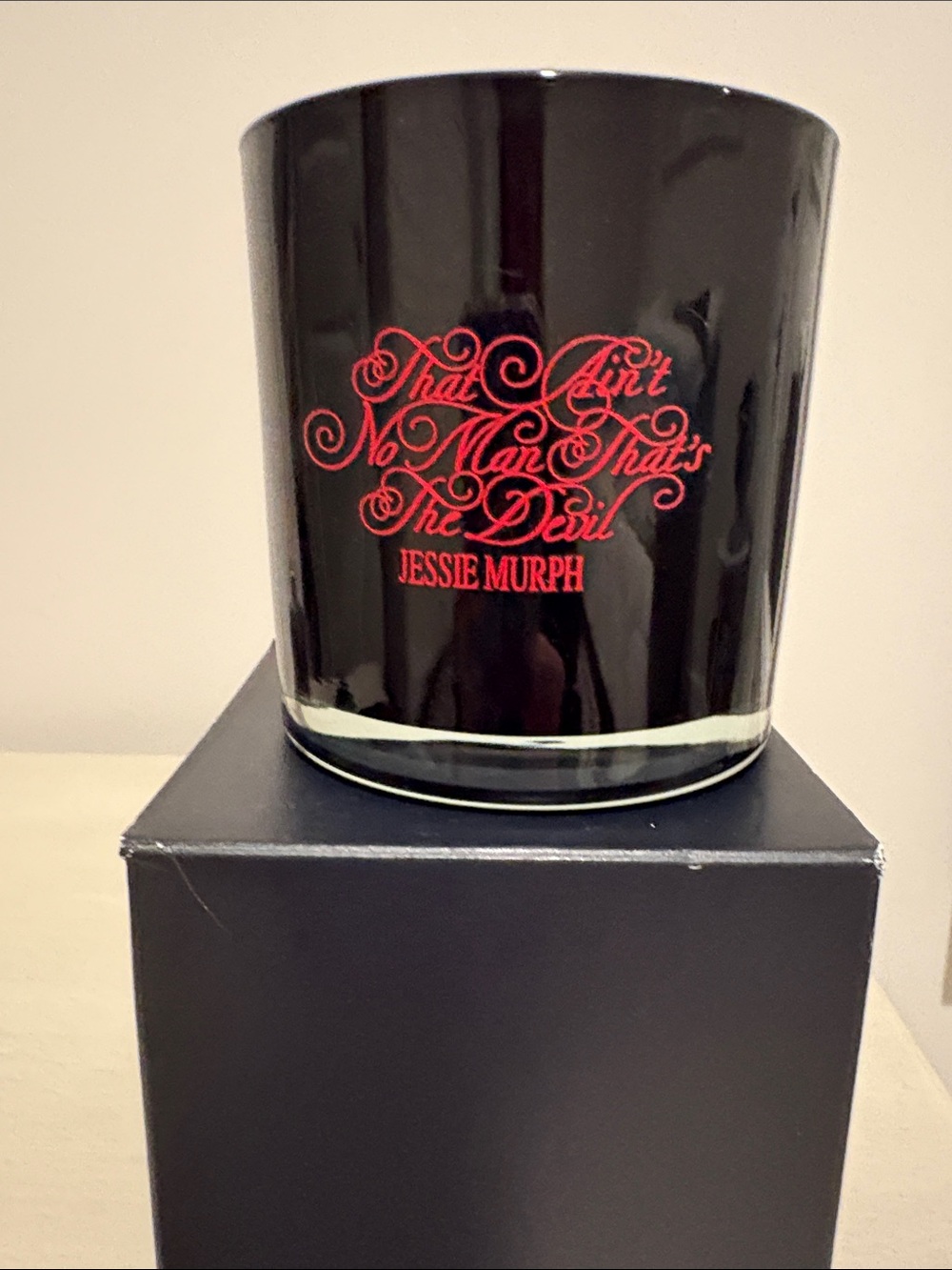 Black Glass Decorative Vessel with Red Script Accent